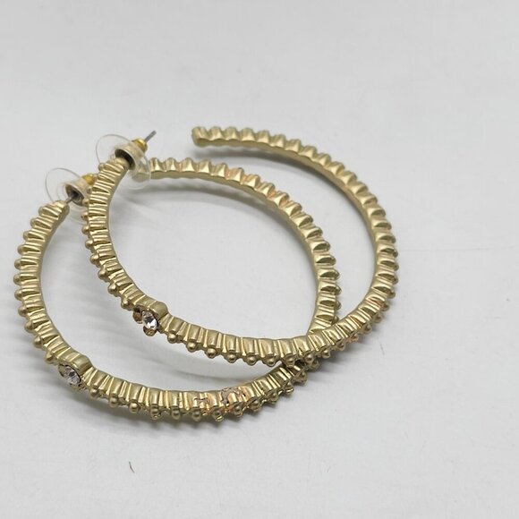 Gold Tone Textured Hoop Earrings With Rhinestone Flower Accents - Picture 6 of 7